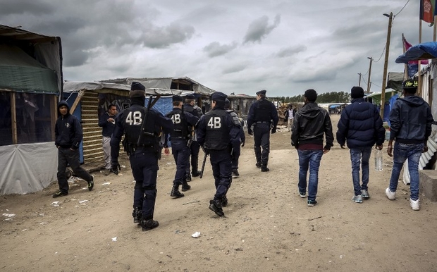 Refugee aid convoy bound for Calais blocked by 'authoritarian' French border authorities