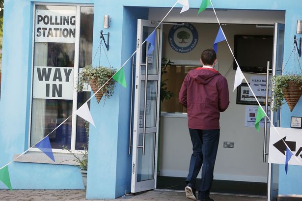 Casting their vote at Moneyrea Primary School polling station in Co Down