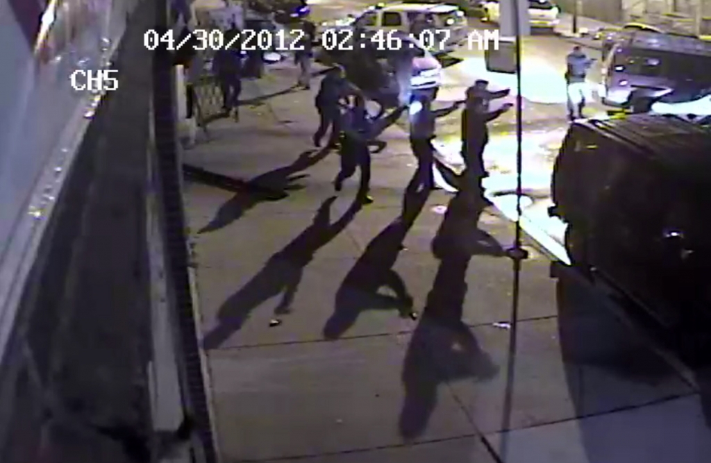 Chicago police fire shots at a vehicle in April 2012