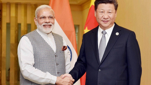 Prime Minister Narendra Modi shakes hands with Chinese President Xi Jinping during a meeting in Tashkent on Thursday on the sidelines of SCO Summit. | PTI