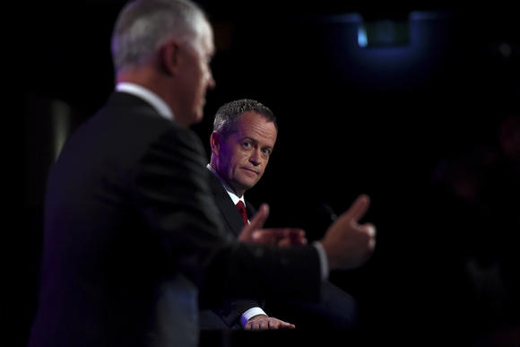 Close												Opposition Leader Bill Shorten listens to Prime Minister Malcolm Turnbull Left as he speaks at the leaders debate in Canberra May 29