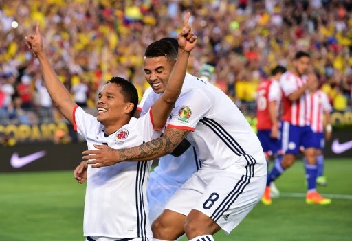 Colombia's Carlos Bacca celebrates with teammates after scoring a goal against Paraguay during their Copa America Centenario match in Pasadena California