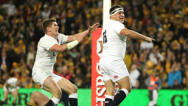 England's Owen Farrell runs to congratulate Jamie George on his try