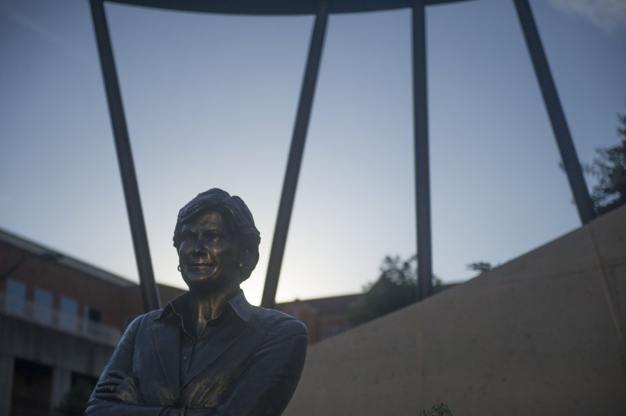 Pat Summitt's statue stands at dusk on Summitt Plaza at the University of Tennessee on Tuesday