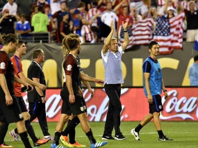 USA's coach Jurgen Klinsmann acknowledges the crowd after defeating Paraguay 1-0 in a Copa America Centenario football tournament match in Philadelphia Pennsylvania United States