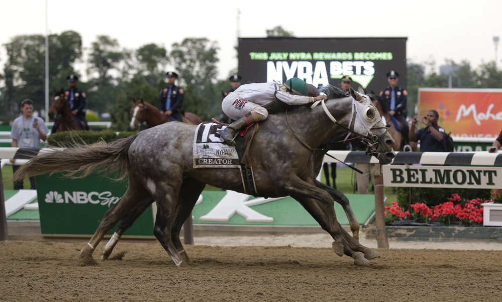 Creator with jockey Irad Ortiz Jr. up edges out Lani with Yutaka Take up to win the 148th running of the Belmont Stakes on Saturday in Elmont N.Y