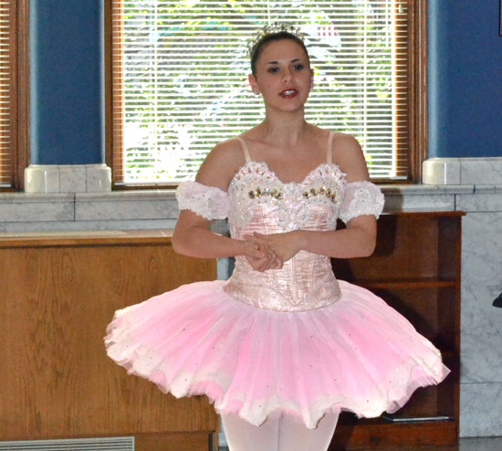 A ballerina from the Fort Wayne Ballet talks to children participating in Brumback Library's Summer Reading Program in 2012