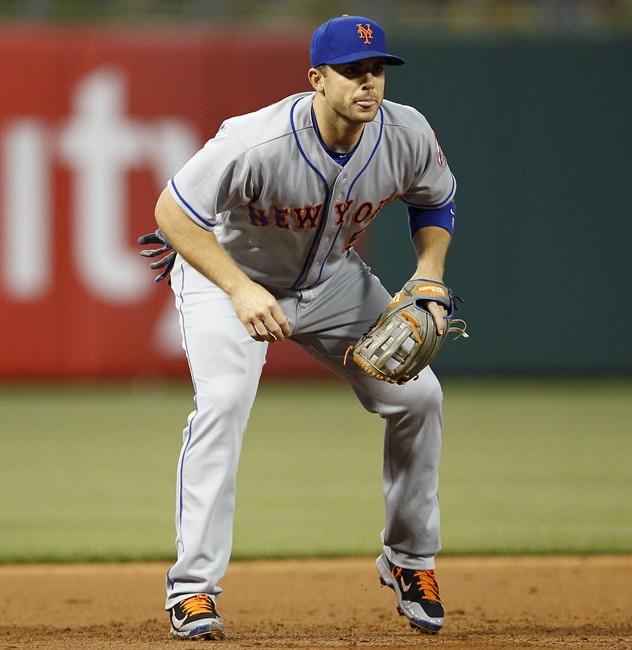 New York Mets David Wright is seen in action during a baseball game against the Philadelphia Phillies in Philadelphia. David Wright avoided the disabled list Tuesday