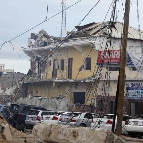 A Somali police officer says a suicide car bomber detonated an explosives-laden vehicle at the gate of a hotel in Mogadishu followed by