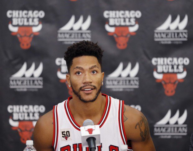 Chicago Bulls Derrick Rose sits down for an NBA basketball media day news conference in Chicago. Two people with knowledge of the deal say the New York Knicks are acquiring Rose from the Chicago Bulls. The Kni