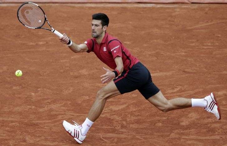 Tennis- French Open Mens Singles Semifinal match- Roland Garros- Novak Djokovic of Serbia v Dominic Thiem of Austria- Paris France- 03/06/16. Novak Djokovic returns a shot. REUTERS  Jacky Naegelen