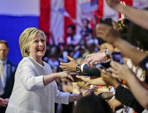 Democratic presidential candidate Hillary Clinton greets supporters as she arrives to speak during a presidential primary election night rally Tuesday