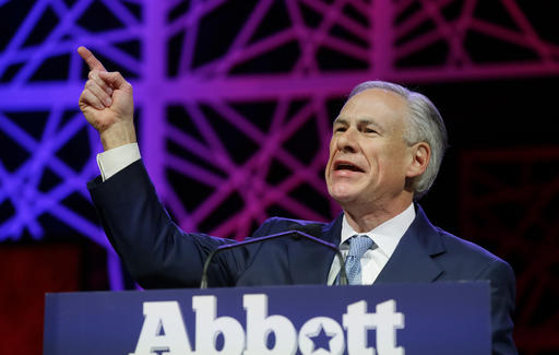 Texas Gov. Greg Abbott speaks during the opening of the Texas Republican Convention in Dallas. Emails from 2010 show that the staff of then Texas Attorney General Greg Abbott investigating Trump University thought