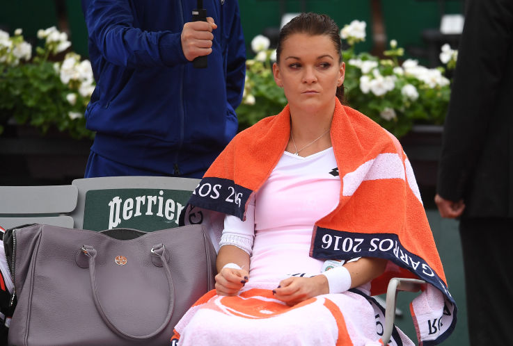 Agnieszka Radwanska was upset by a foe ranked No. 102 &#8212 and upset by conditions. “How can you allow players to play in the rain?&#8221 she said