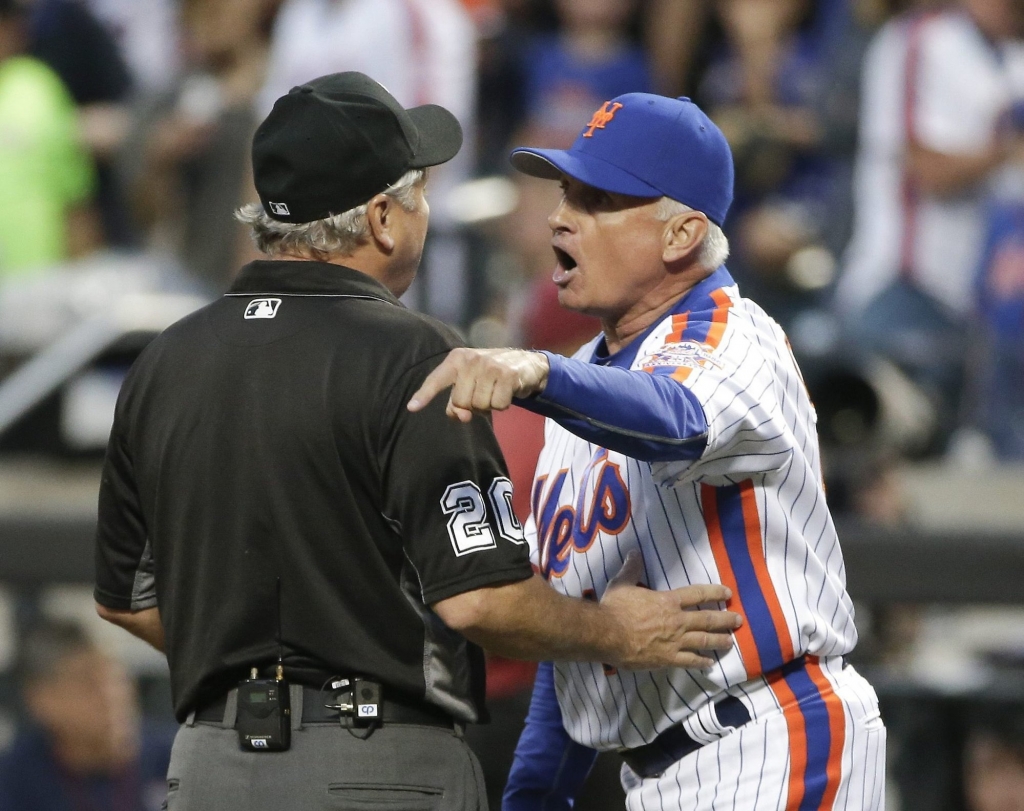 New York Mets manager Terry Collins argues with umpire Tom Hallion after being ejected during the third inning of a baseball game against the Los Angeles Dodgers Saturday