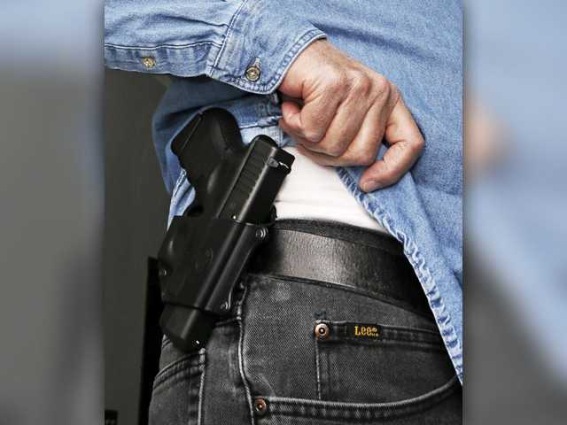 CALIFORNIA: State's strict concealed-gun rules restored by court