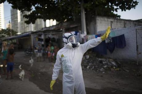 A municipal worker gestures during an operation to combat the Aedes aegypti mosquitoes in Brazil