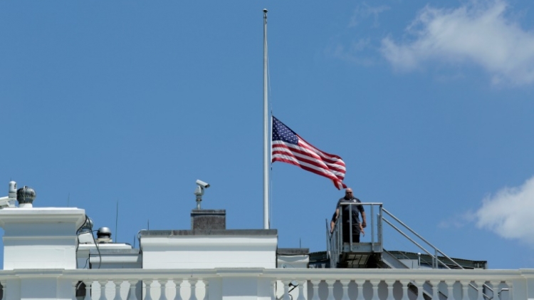 The flag of the White House flies at half mast