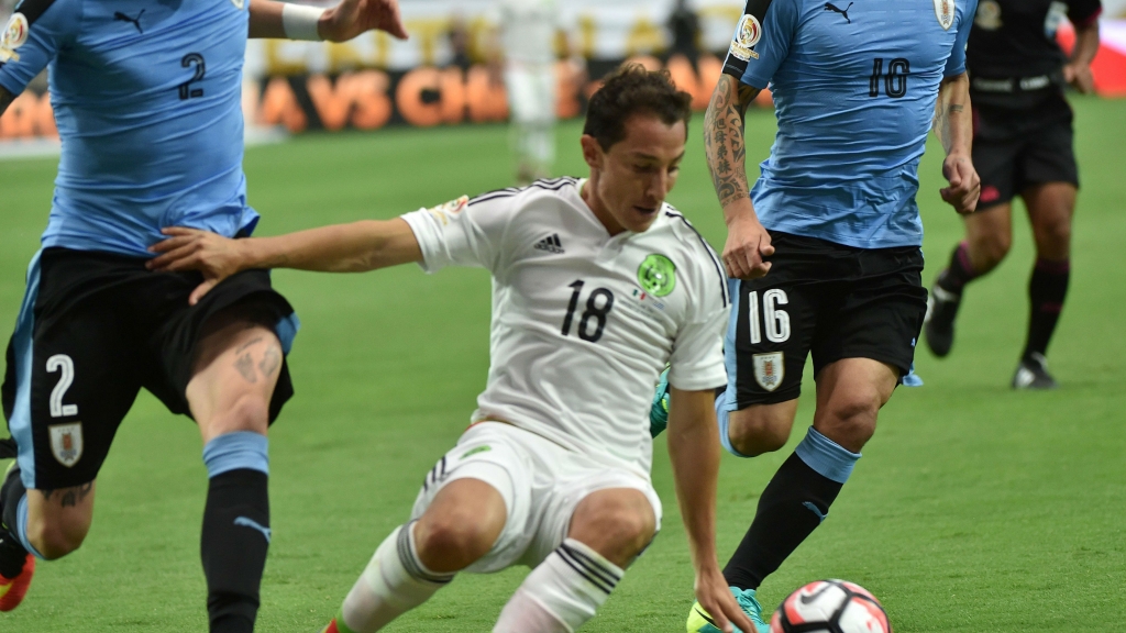 Fights in stands bottles thrown on pitch during Copa America match between Mexico and Uruguay