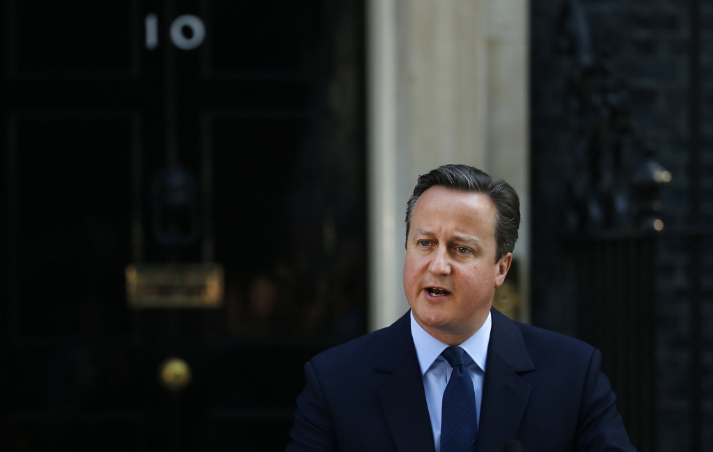 Britain's Prime Minister David Cameron speaks to the media in front of 10 Downing street as he goes on to announce his resignation following the result of the EU referendum in which the Britain voted to leave the EU in London Friday June 24 20