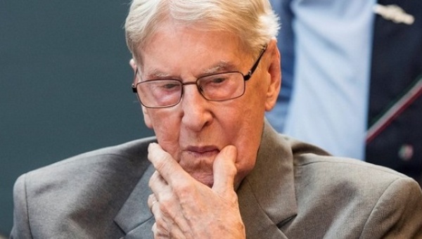 Defendant Reinhold Hanning a 94-year-old former guard at Auschwitz death camp sits in a courtroom before his verdict in Detmold Germany