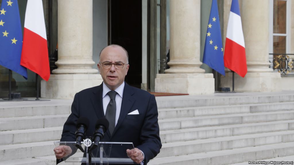 French Interior Minsiter Bernard Cazeneuve speaks to the media after a crisis meeting at the Elysee Palace in Paris France