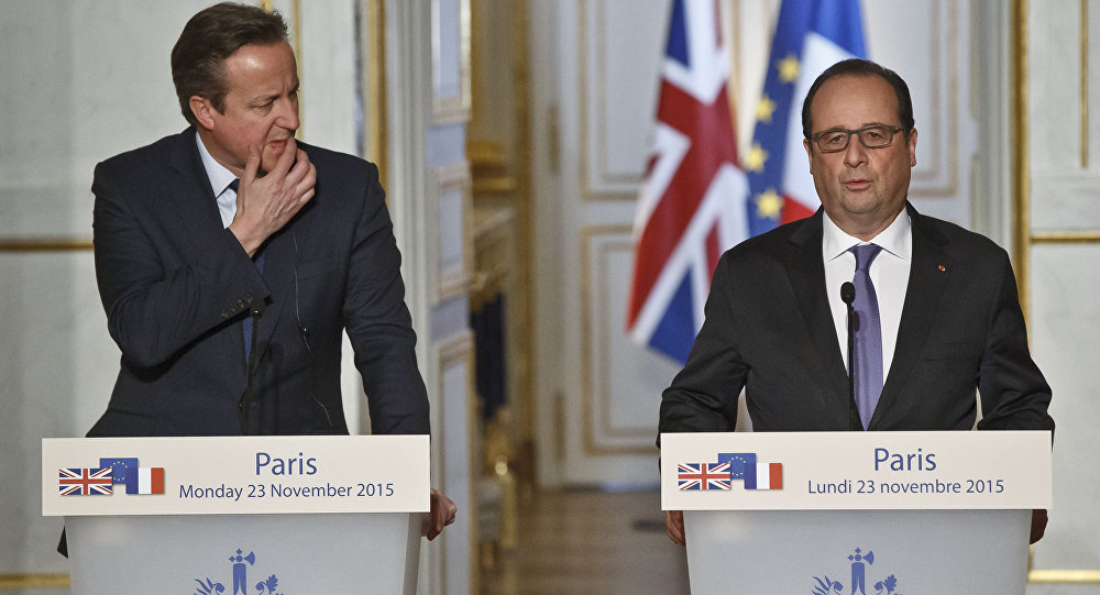 Britain's Prime Minister David Cameron left and France's President Francois Hollande issue a joint statement to the media at the Elysee Palace in Paris Monday Nov. 23 2015