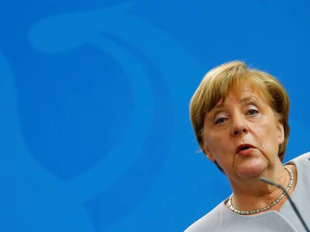 German Chancellor Angela Merkel attends a news conference at the chancellery in Berlin Germany