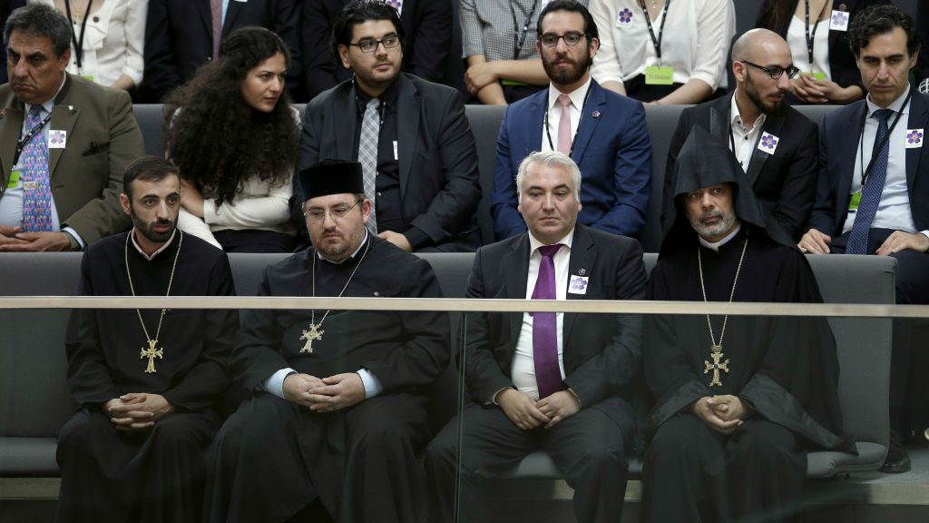 Representatives of the Christian Church of Armenia attend a meeting of the German Federal Parliament Bundestag at the Reichstag building in Berlin Germany Thursday