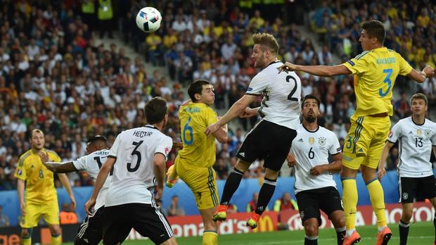 Germany's defender Shkodran Mustafi scores the opening goal for Germany in a 2-0 win over Ukraine.                     Getty Images