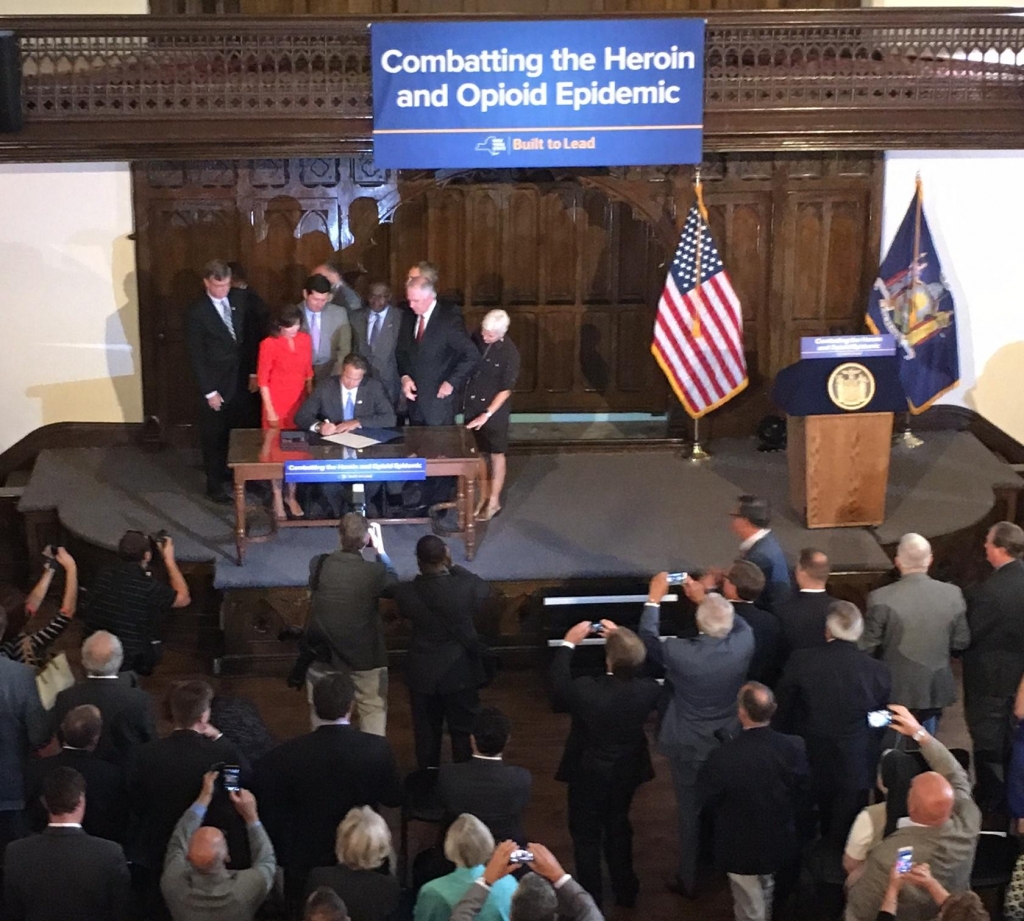 Gov. Cuomo signs new legislation to fight opioid epidemic at Evergreen Commons