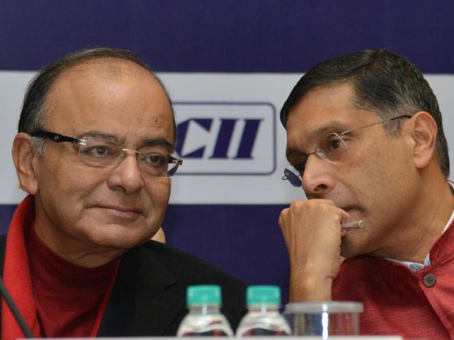 Union Finance Minister Arun Jaitley and Chief Economic Adviser Arvind Subramanian engrossed in conversation. File