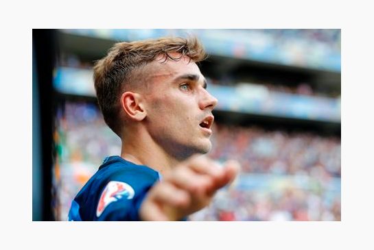 France's Antoine Griezmann walks on the pitch during the Euro 2016 round of 16 soccer match between France and Ireland at the Grand Stade in Decines-Charpieu near Lyon France Sunday