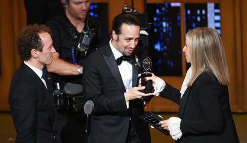 Barbra Streisand presents the award for best musical to Lin Manuel Miranda