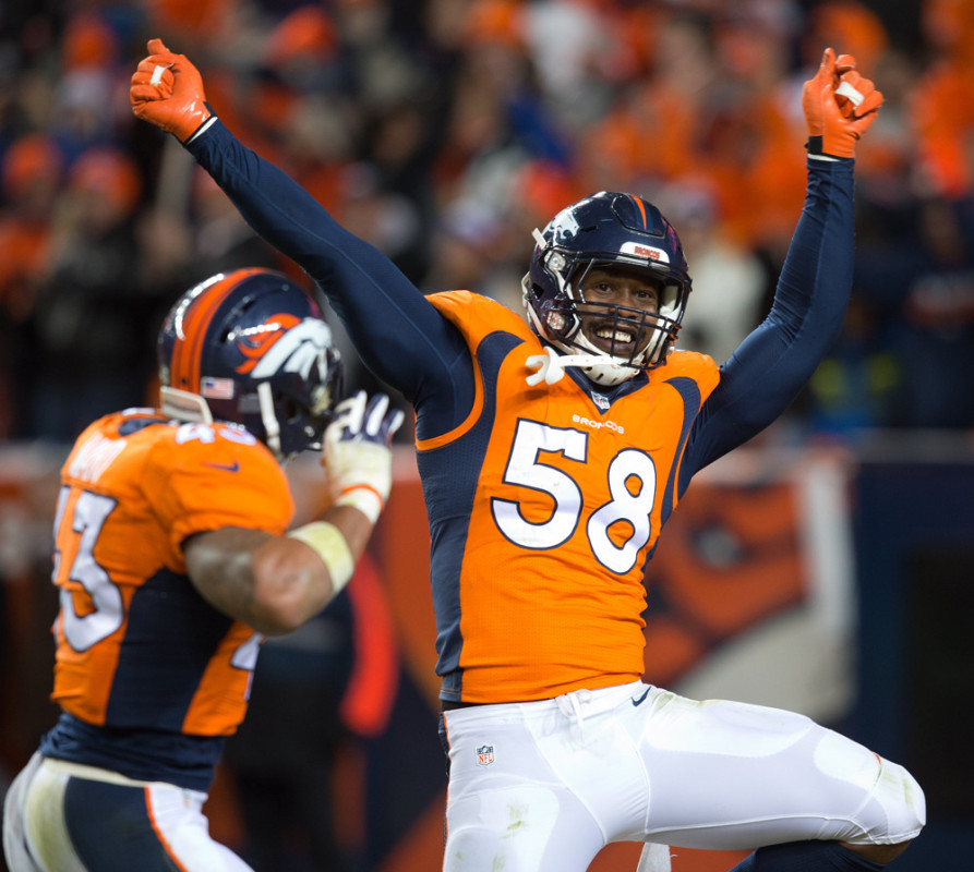 Jan. 17 2016- Denver Colorado U.S- Broncos OLB VON MILLER right celebrates with team mates after picking up a fumble during the 4th. Quarter at Sports Authority Field at Mile High Sunday afternoon. The Broncos beat the Steelers 23-16 and advance