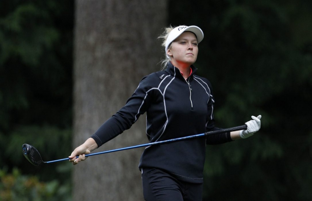 Brooke Henderson of Smith Falls Ont. watches her drive off of the fourth tee during the third round of the KPMG Women's PGA Championship on Saturday. Henderson shot 73 to drop into the group at even par