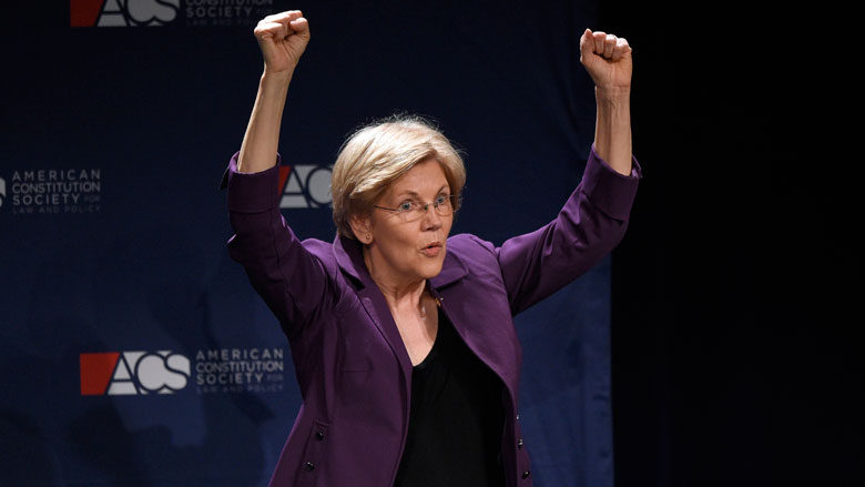 Sen. Elizabeth Warren D-Mass. gestures to the crowd after she spoke at the American Constitution Society for Law and Policy 2016 National Convention Thursday