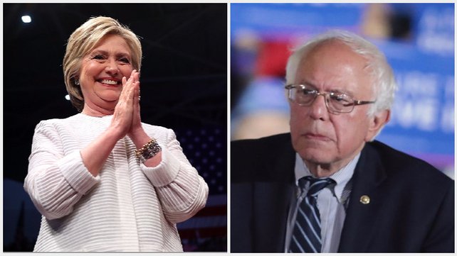 Hillary Clinton hails milestone as Bernie Sanders refuses to concede defeat