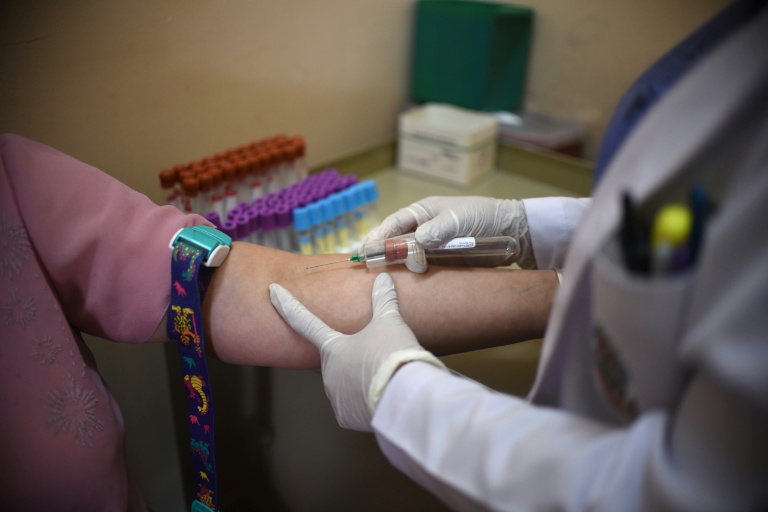 AFP  File  Johan Ordonez Genomic testing of tumors is making it possible to use targeted medicine such as immunotherapy to help fight cancer and protect healthy cells