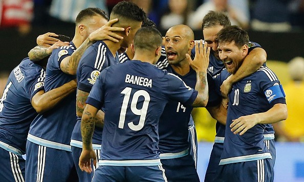 HOUSTON TX- JUNE 21 Lionel Messi #10 of Argentina celebrates with teammates after scoring a goal on a free kick in the first half against the United States during a 2016 Copa America Centenario Semifinal match at NRG Stadium