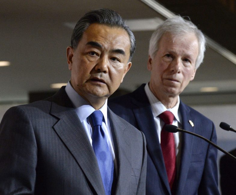 China's Minister of Foreign Affairs Wang Yi and Canada's Minister of Foreign Affairs Stéphane Dion take part in a press conference on June 1 in Ottawa