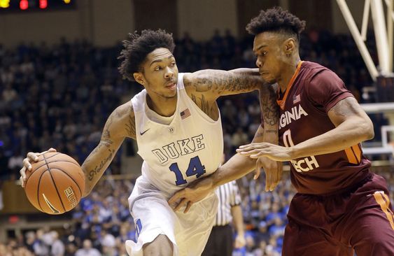 Duke's Brandon Ingram dribbles the ball as Virginia Tech's Shane Henry defends during the first half of an NCAA college basketball game in Durham N.C. Ben Simmons and Brandon Ingram look to be the