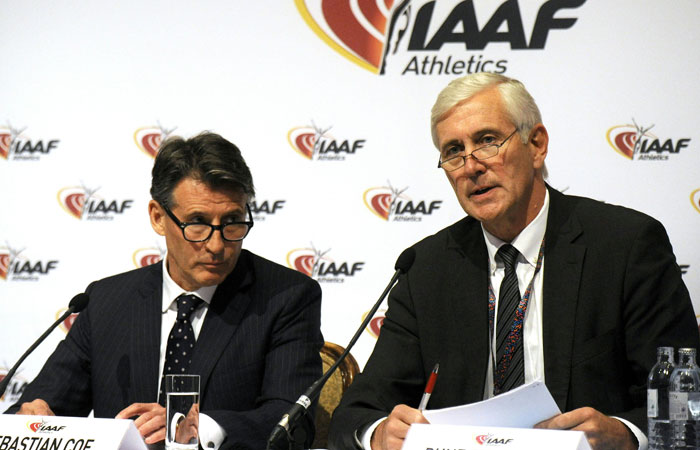 The International Association of Athletics Federations President Sebastian Coe and Rune Andersen attend a press Conference at the IAAF-Council in Vienna on June 17. — AFP