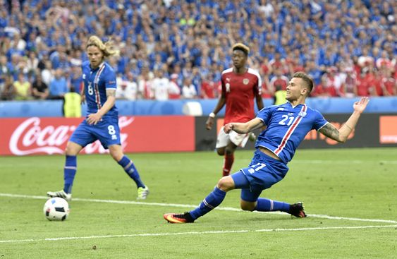 Traustason scores his team's second goal during the Euro 2016 Group F soccer match between Iceland and Austria at the Stade de France in Saint-Denis north of Paris France Wednesday