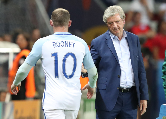 England coach Roy Hodgson salutes Wayne Rooney as he leaves the pitch to be replaced during the Euro 2016 round of 16 soccer match between England and Icelan