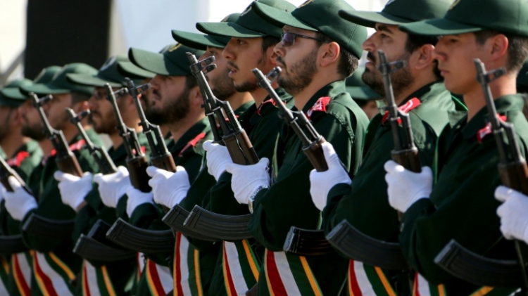 Iranian soldiers from the Revolutionary Guards march march at a military parade in Tehran