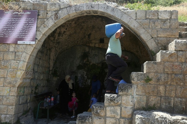 Israeli police attacked by Palestinians at holy site