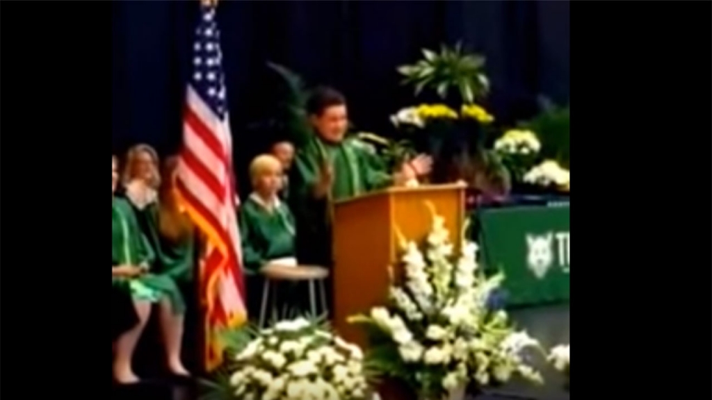 Jack Aiello an eigth grader at Arlington Heights middle school in Chicago delivers a witty speech at graduation