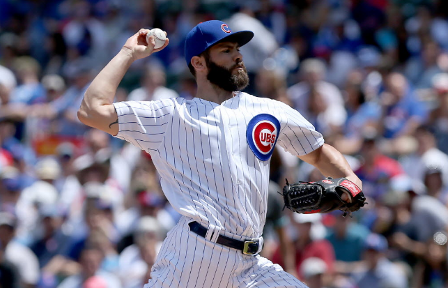 Jake Arrieta pitches in the first inning against the Diamondbacks on Sunday at Wrigley Field. | Dylan Buell  Getty Images