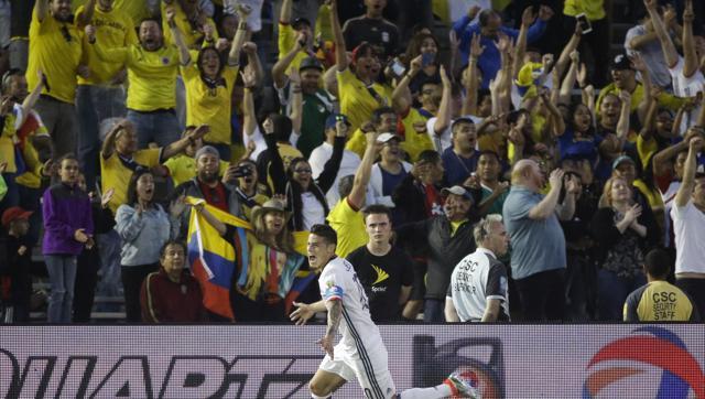 James Rodriguez celebrates after scoring Colombia’s second goal